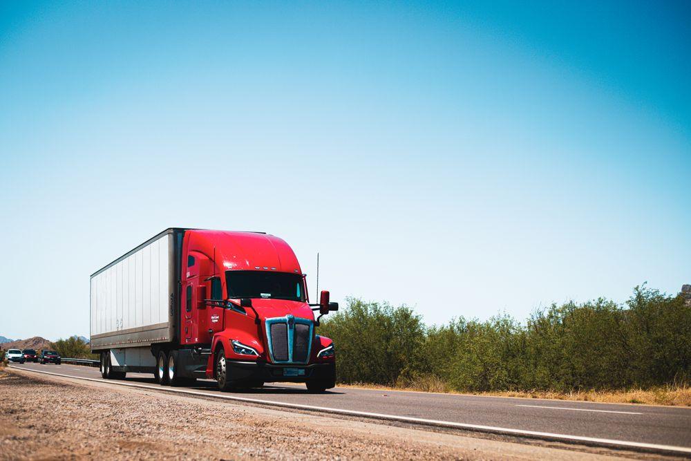 Semi truck pulling an enclosed dry van trailer